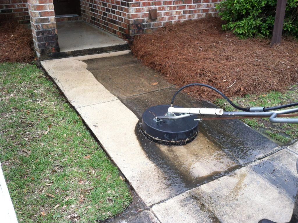 Driveway cleaning with rotary surface disc