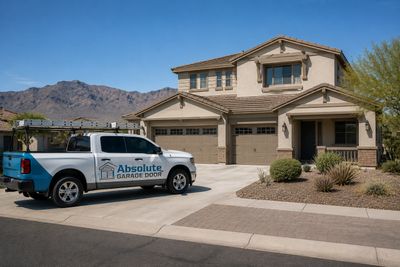 Garage door repair in Queen Creek AZ — Absolute Garage Doors service vehicle at a new construction h
