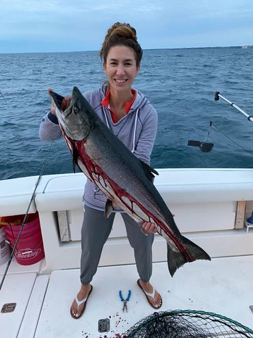 18 lb King Salmon caught by woman during Lake Michigan Charter Fishing Trip