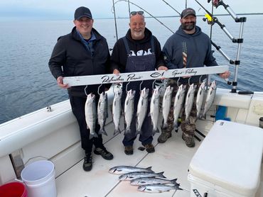 Lake Michigan Charter Fishing Trip with 3 Guys and Rack of Coho Salmon