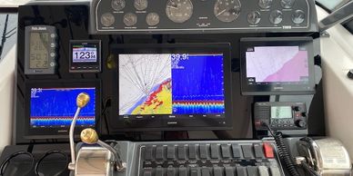 The Relentless Pursuit features 3 Garmin chartplotters  with dual Garmin UHF radios