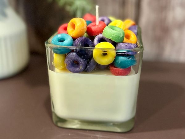 Colorful cereal loop candle in glass jar