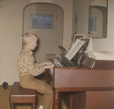 Darcy Kuronen playing the piano, 1967