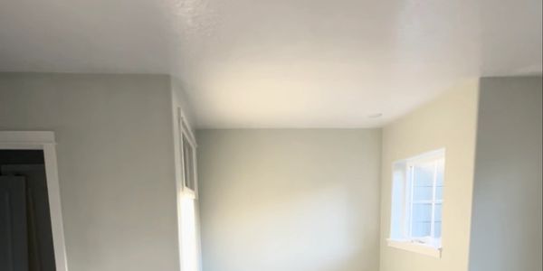 Freshly painted walls and ceiling. Careful preparation, attention to details leads to clean lines.