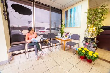 A women sitting in office.