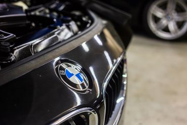 BMW car logo on black car