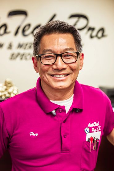 Smiling Man with Pink Uniform