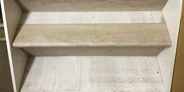 A step with one peace of LVT cladding on it  