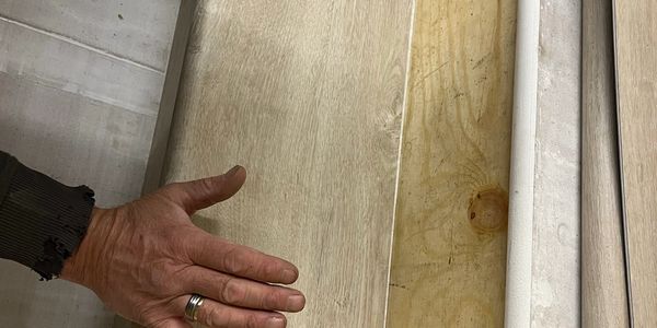 LVT stair covering being fitted to a step 