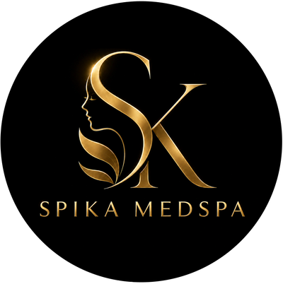 Elegant gold logo for Spika Medspa with a woman's face silhouette.