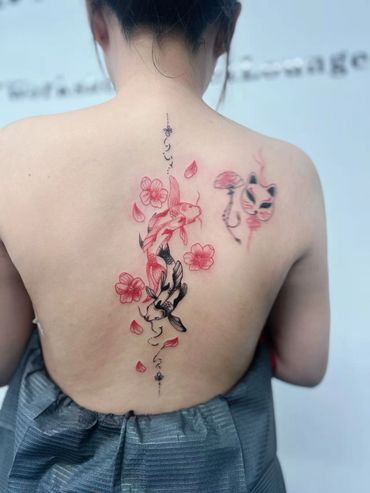 color fineline koi fish tattoo by mostro tattoo singapore, best tattoo studio in singapore