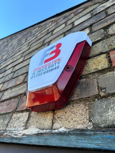 Bridges Fire & Security alarm mounted to exterior wall