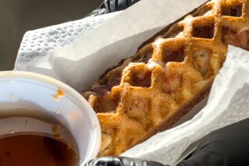 OUR TAKE ON CHICKEN AN WAFFLES!  BELGIAN WAFFLE WITH CHICKEN, & BACON COOKED INSIDE AND SERVED WITH 