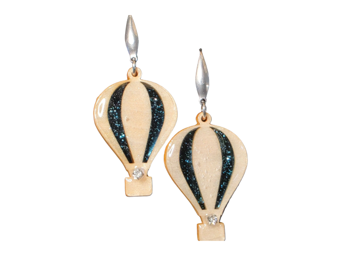 Hot air balloon-themed earrings with black stripes and rhinestones.