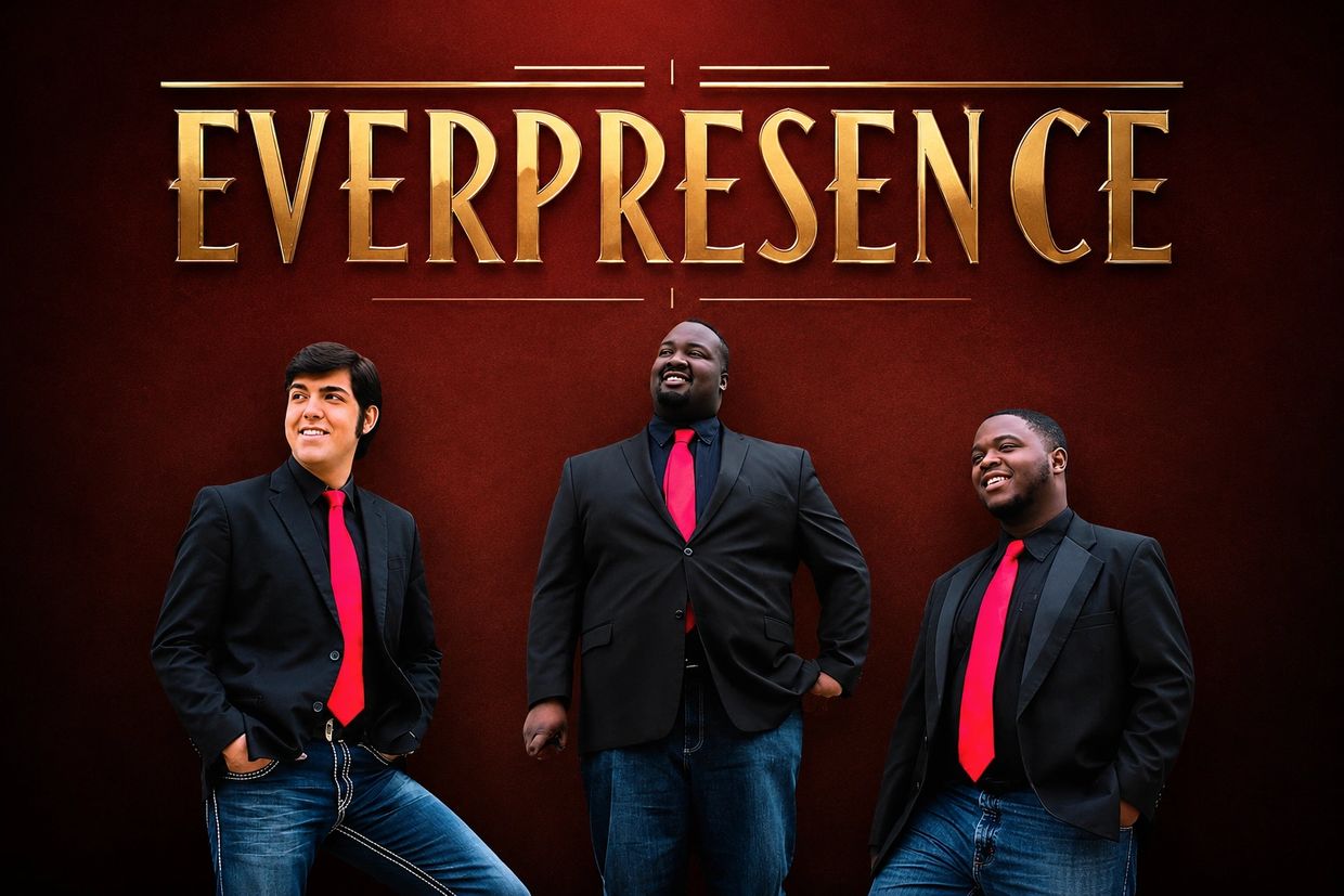 Three men in black blazers and red ties pose under the golden word 'EVERPRESENCE'.