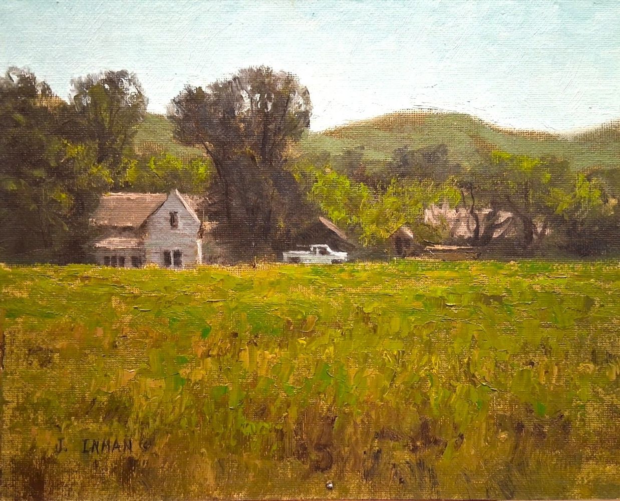 Landscape painting with cottage.