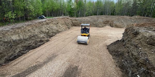 Engineered foundation base with 1 1/2” stone and compaction to specification. 