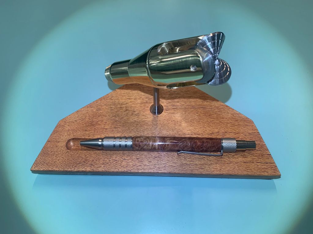 A pen stand with deep sea oil rig drill bit.