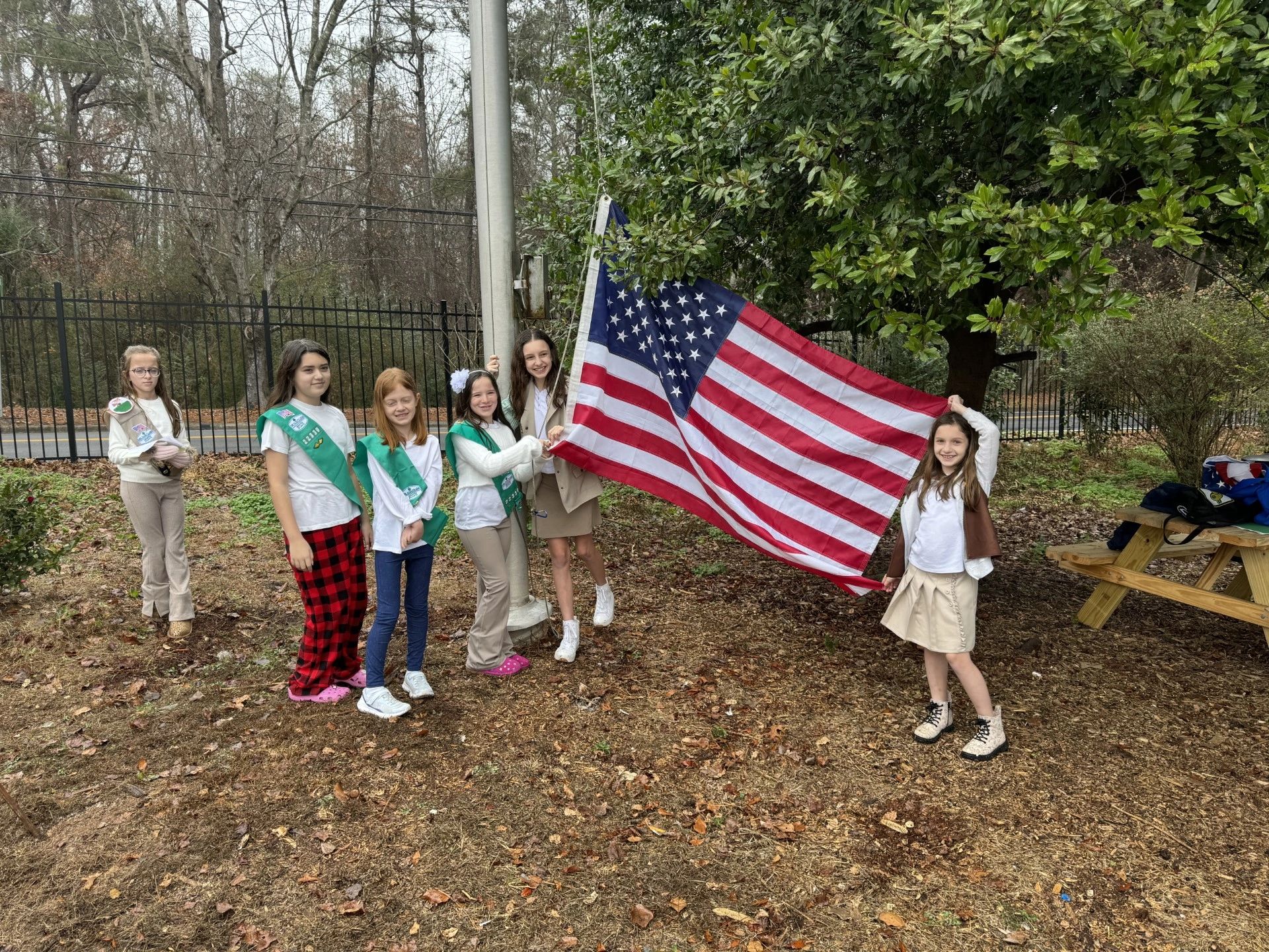 Girl Scouts Raise our Flag