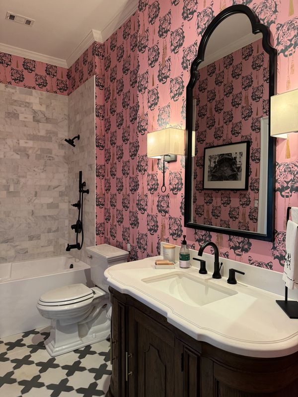Pink tiger and tassel wallpaper in bathroom 