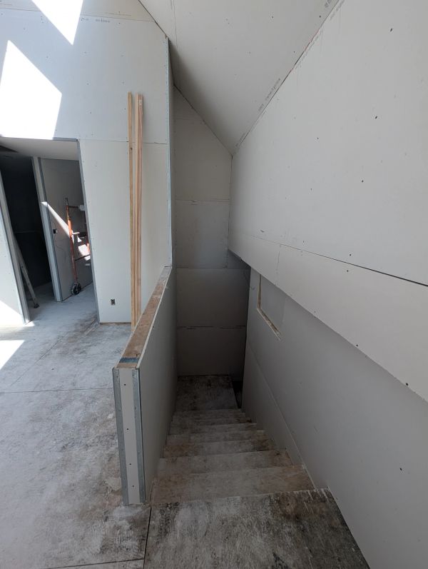 Unfinished stairway in a construction site.
