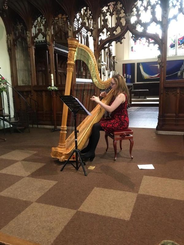 Picture of me playing the harp in a church 