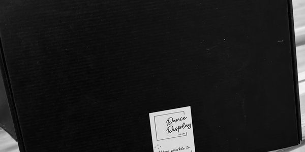 Black box with "Dance Displays" sticker.