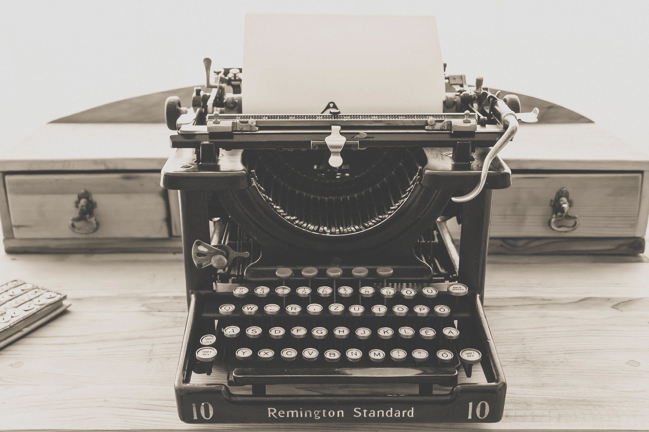 Vintage Remington Standard typewriter with blank paper.