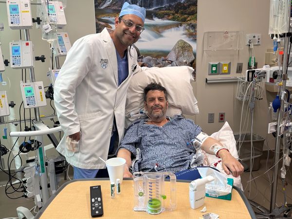Ben with Dr. Mathur, Mayo's chief of hepatic transplant surgery, one day after his third liver surge
