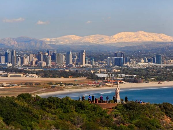 A view of downtown San Diego facing the eastern snow capped mountains from Point Loma.