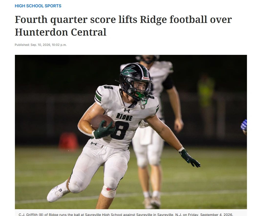Ridge football player runs with the ball during a high school game.