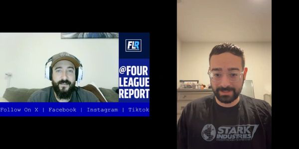 Two men in a video call, one wearing headphones and a cap, the other in a Stark Industries shirt.