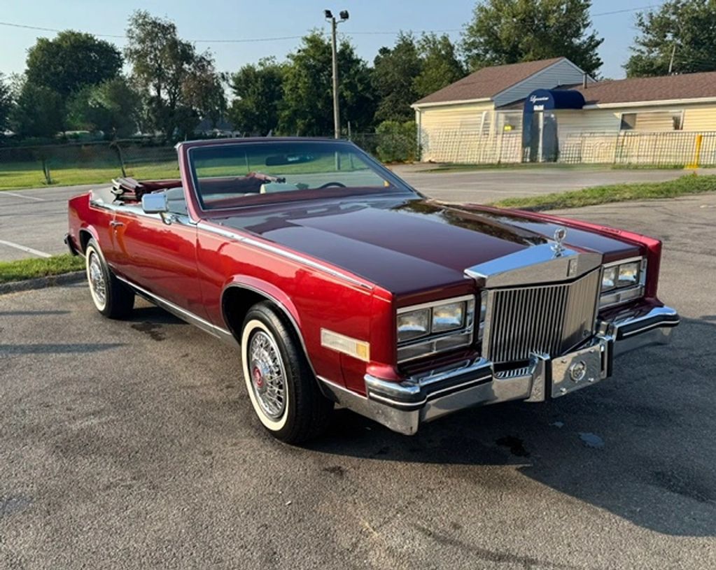 1984 Cadillac Eldorado convertible in autumn Maple fire mist  & white interior 