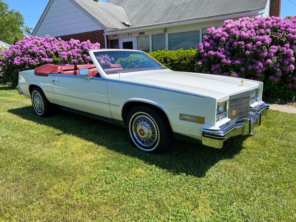 1985 White Eldorado convertible with Red interior , 