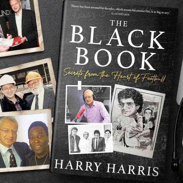 Book titled 'The Black Book' by Harry Harris on a desk with photos and headset.