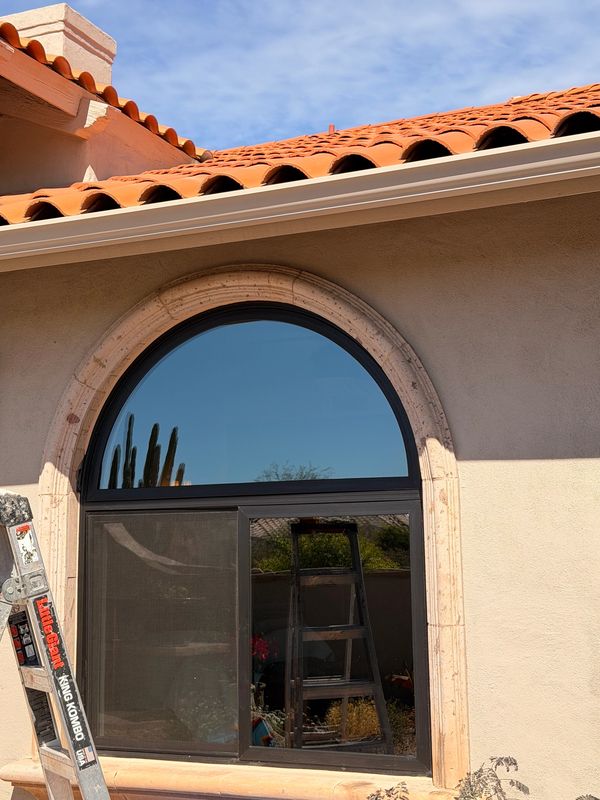 Milgard Black V400 Tuscany window replacement; Best vinyl replacement windows; arched black windows