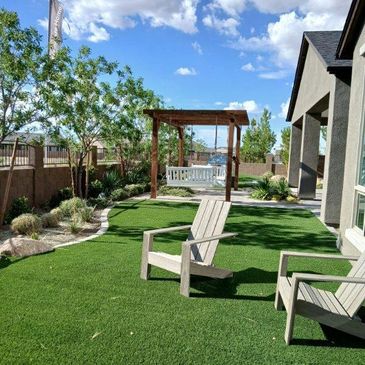 Expert landscaping services featuring plants, trees, pavers, artificial turf and maintenance.