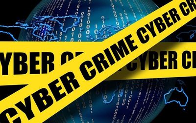 Crime tape that reads cyber crimes.