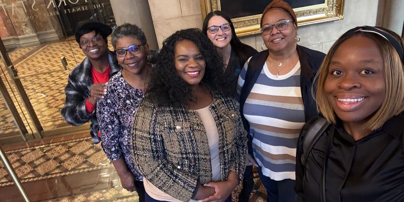 A group of women's with smile face
