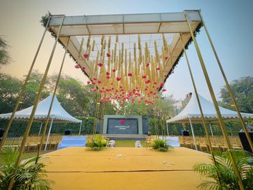 Outdoor event setup with floral decorations and seating area at Bougainvillea Farms.