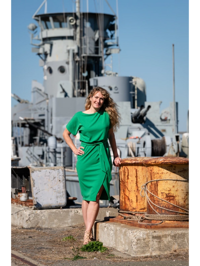 Sarah Stevens with the "Mighty Midget" in the background at Mare Island.