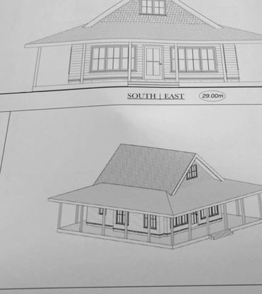 Architectural drawings of a house with detailed roof and porch.