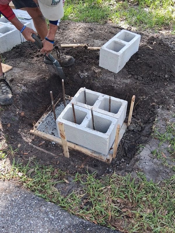 Building concrete base for brick paver mailbox pad