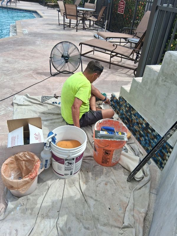 Installing mosaic tile to pool shower area