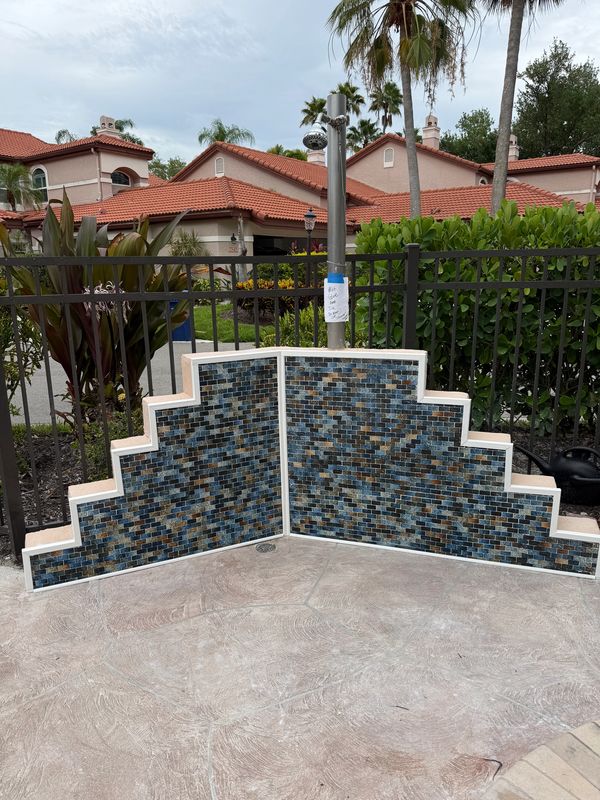 Completed Tile installation project around outdoor shower