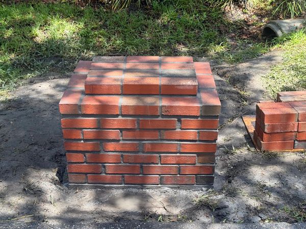 Completed brick paver installation around mailbox base. Ready for mailbox install