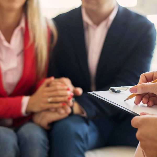 an adult couple during a marriage therapy session