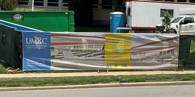 Construction site banner for UMKC Aviation Center.