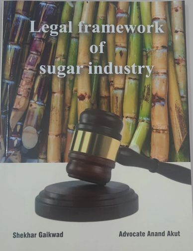 Book cover on sugar industry legal framework with gavel.