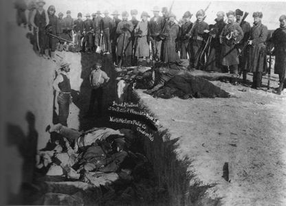 US Soldiers burying Native Americans in a mass grave.  Wounded Knee 1890